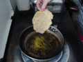 Adding escalope to frying pan