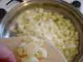 Adding garlic to pan