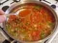Adding tomato puree