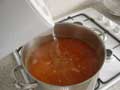 Adding boiling water to dilute sauce