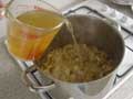 Adding the chicken stock