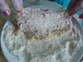 Coating veal escalope in breadcrumbs