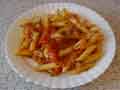 Finished penne arrabiata on a plate