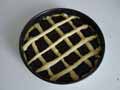 Pastry strips across the jam tart Pastry strips across the jam tart