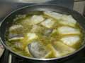 Frying baccala or salt cod Frying baccala or salt cod