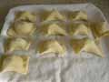 Laying tortelli on a tray