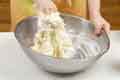 Mixing pizza dough Mixing pizza dough