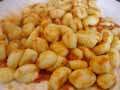 Mix gnocchi in the tomato sauce