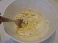 Mixing ingredients with wooden spoon Mixing ingredients with wooden spoon