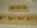 Tortelli mounds on pastry