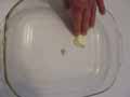 Buttering ovenproof dish Buttering ovenproof dish