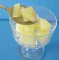 Dividing pineapples into sundae glasses