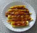 Polenta covered with tomato pasta sauce
