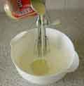 Pouring in the condensed milk