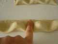 Pressing tortelli pastry down to seal