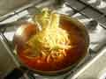 Add spaghetti to sauce