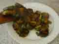 Spoon zucchini onto a hot plate